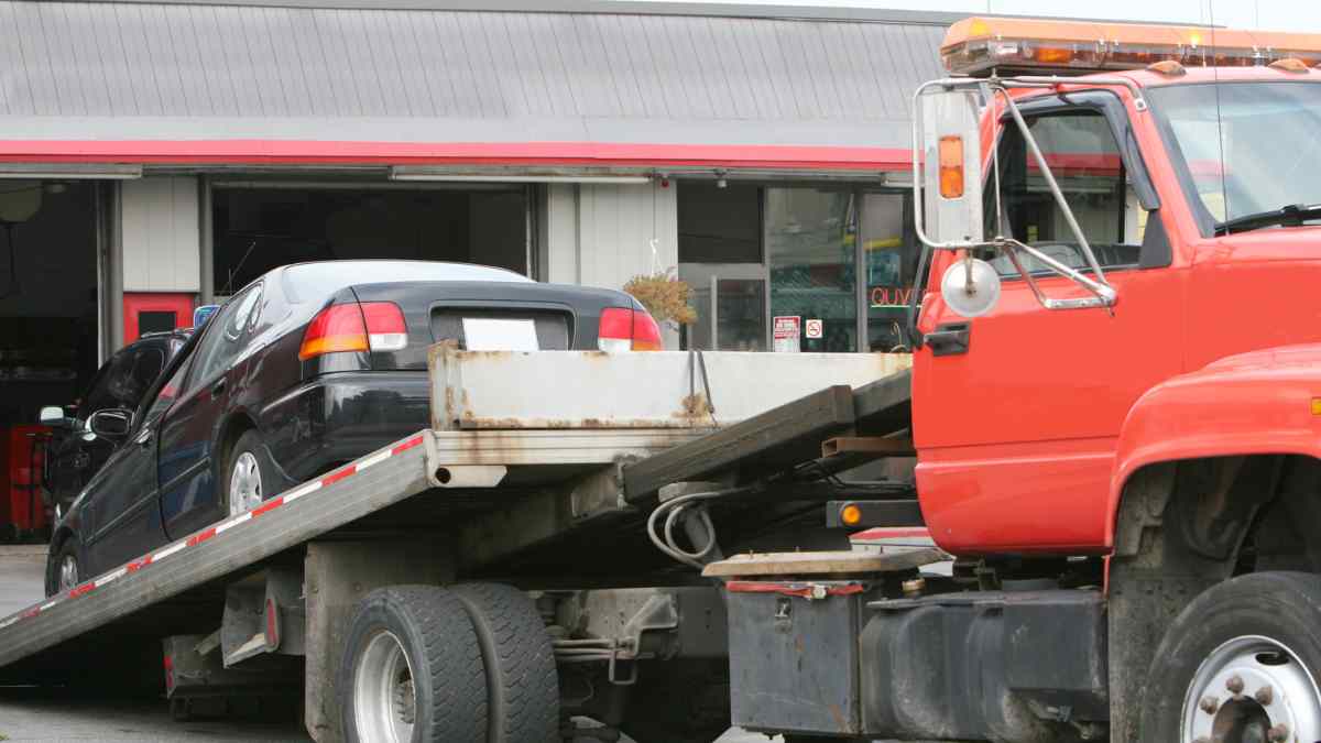 A vehicle being repossessed by a title loan company.